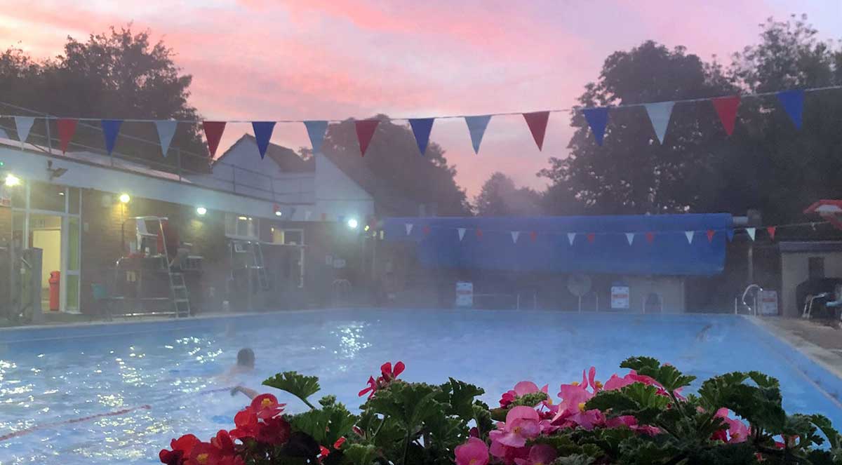 Pink sunrise and flowers, Chesham outdoor pool